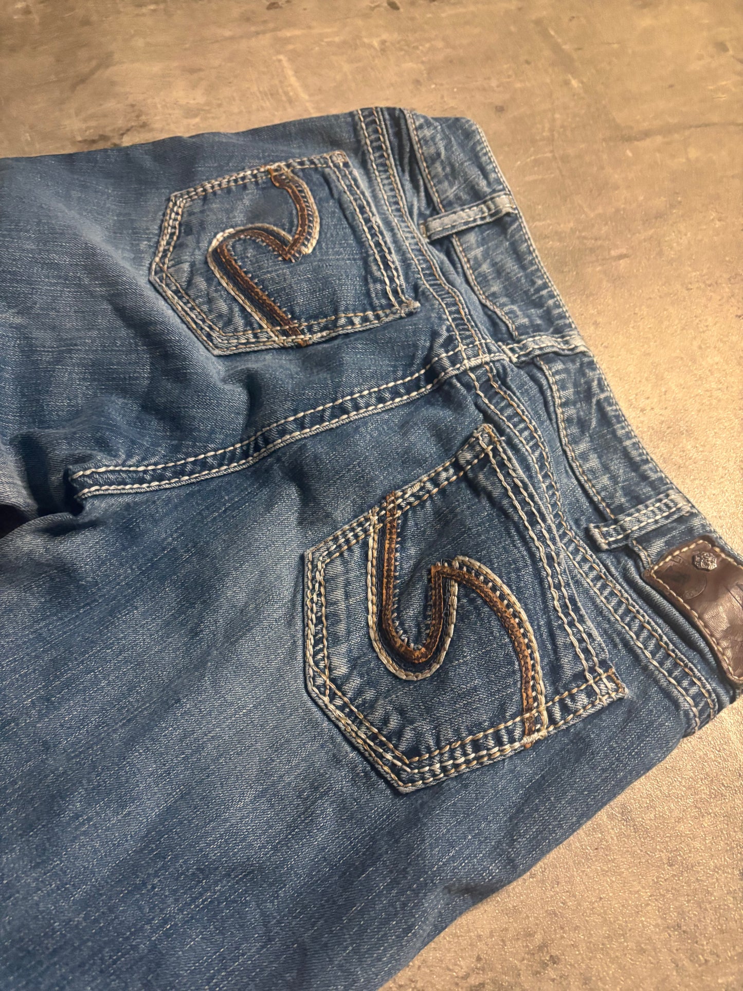 Silver bootcut jeans / M