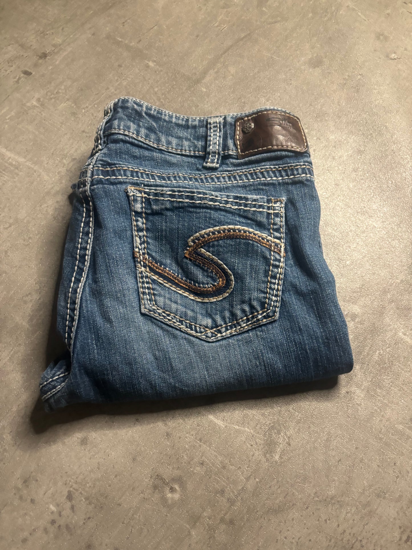 Silver bootcut jeans / M